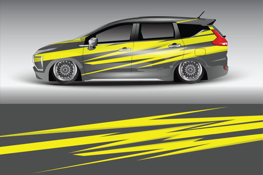 Sleek modified vehicle with vibrant yellow graphics parked against a gradient backdrop