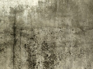 Grey abstract grunge concrete wall rusty texture stone wall papercut texture vintage decorative wide wall background.Grey rough crack cement texture stone concrete,rock plastered stucco wall.