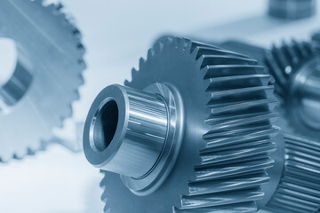 Close up the transmission bevel gear spare parts in the light blue scene.