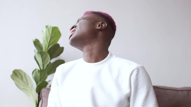 Emotional online chat conversation of a young African American blogger. Expressing intolerance irritation anger.
