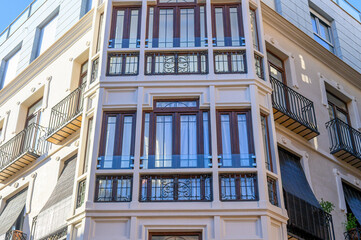 Architectural features of windows in an apartment building, Murcia, Spaina
