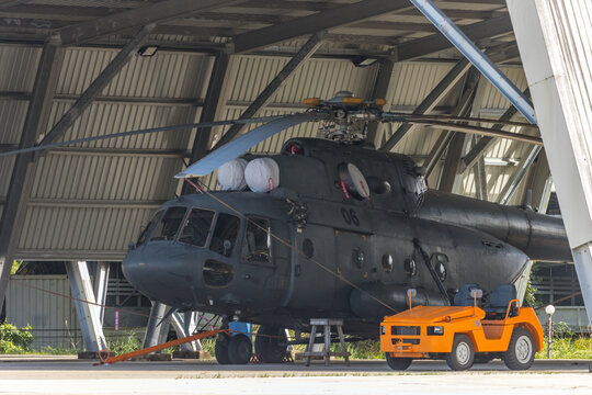 Military helicopter MI 17 parked in the hangar