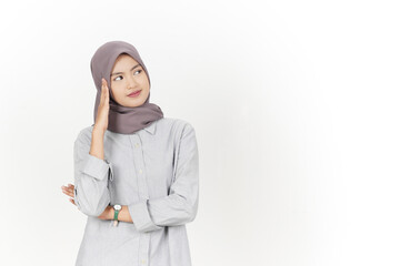Thinking and Curious Of Beautiful Asian Woman Wearing Hijab Isolated On White Background
