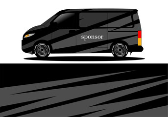 Sleek black van with dynamic stripes parked on a smooth surface, showcasing modern design
