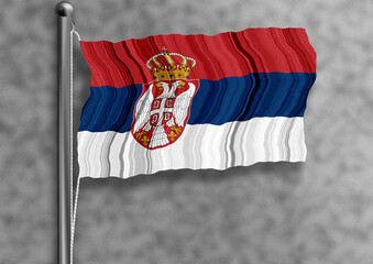 Serbian flag flying on a flagpole, isolated, textured wall in the background.