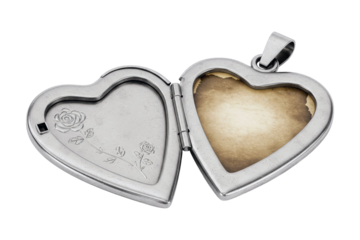 Silver heart locket with rose engraving isolated on white background