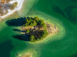 Tiny Island Captured from above with Pine Trees, Lago del Predil (Lake Predil), Italy Tarvisio