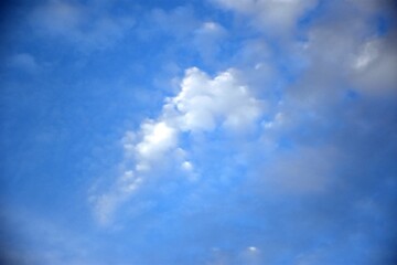 blue sky at east with cloud around moon