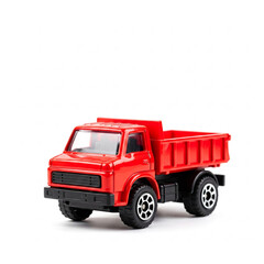 Red toy dump truck on white background, showcasing simplicity and playfulness, ideal for children's product or transportation concepts, free space for text
