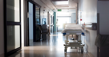 Healthcare, empty hospital and bed in hallway for service, medical care and health insurance....