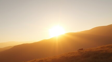 Golden sunset over a mountain range.