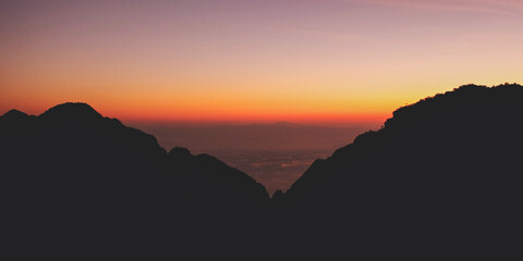 Landscape image of mountains view and colorful sky at dawn