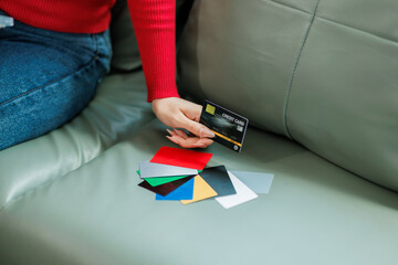 She used her credit card to buy clothes online.