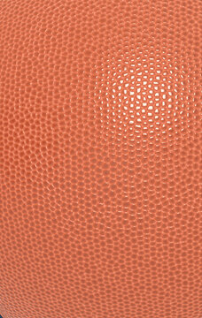 Basketball ball leather texture with bumps pattern background. Sports theme banner backdrop. Orange rubber pebbles grain dots texture.