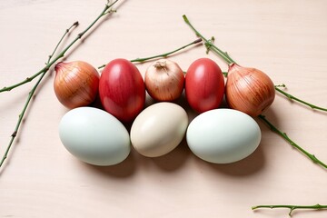 Easter eggs on a white wooden background.