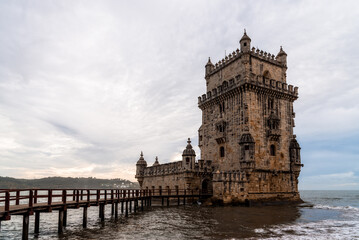 Obraz premium Belem Tower stands majestically on the Tagus River, a historic symbol of Lisbon maritime past.