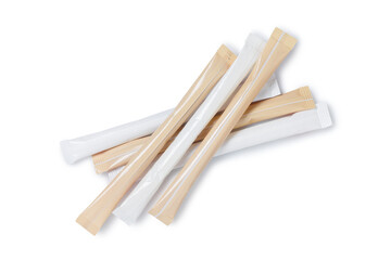 white and brown sugar in paper sticks