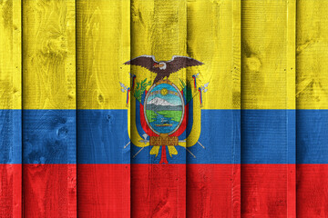 Aged wooden tags show the national banners of ecuador with blue and yellow stripes and Colombia...
