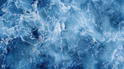 Obraz premium An image displaying the essence of turquoise sea waters with intricate foam details, providing a mesmerizing and artistic natural texture. through abstract art