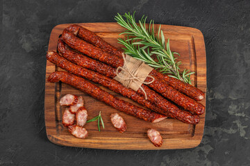 Thin dry kabanosy sausages. Smoked homemade sausage