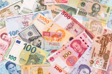 Many banknotes from different countries of the world of different denominations