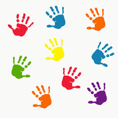 prints of children's hands with multi-colored paints on a white background
