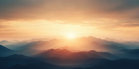 Sunrise over misty mountains creating a serene and beautiful landscape at dawn in nature
