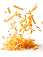 Fototapeta premium Shredded cheddar cheese strips falling on a white background, 