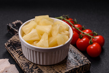 Tropical sweet tinned pineapple fruit sliced into slices