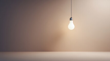 lone lightbulb suspended in spacious uncluttered room symbolizes spark of creative thought