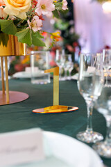 Guest table number. Wedding table in the restaurant.