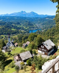 Serene Alpine Landscape with Charming Village and Majestic Mountains