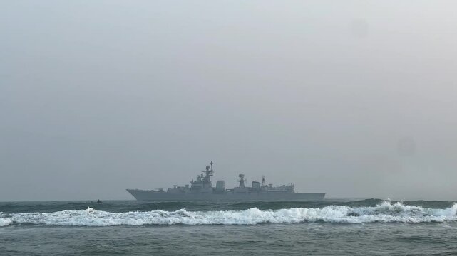 A navy ship INS near the Puri beach during Navy day 2025.