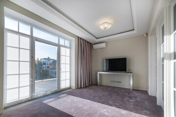 A room in neoclassical style, on the second floor of a luxurious country mansion. Panoramic window with balcony door. Soft floor covering.