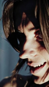 Intense woman face expression with dramatic shadows cinematic look