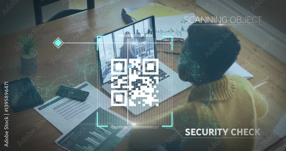 Aufkleber qr code scanning animation over person working at desk with laptop