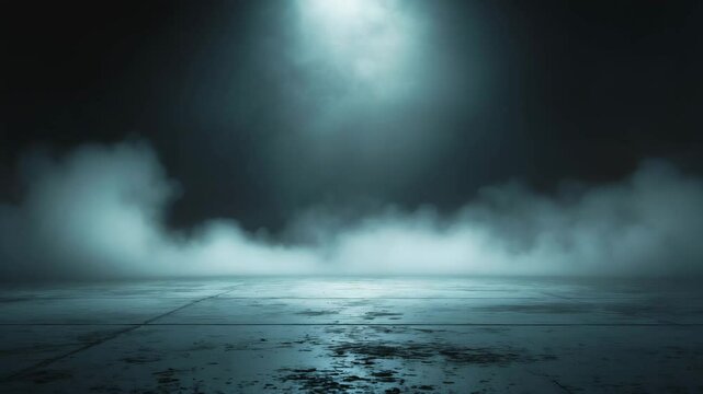 Vacant concrete floor featuring a grunge texture background illuminated by spotlights and enveloped in fog or mist.