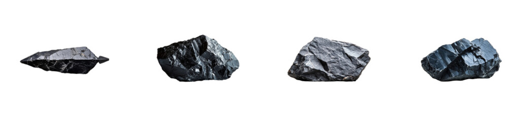 Four black raw ore samples on a black background, cut out transparent