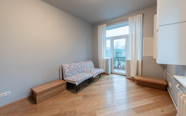 Minimalist Living Room With Natural Light and Wooden Flooring