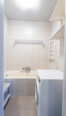 Minimalist Bathroom Interior With Bathtub, Sink, and Modern Design