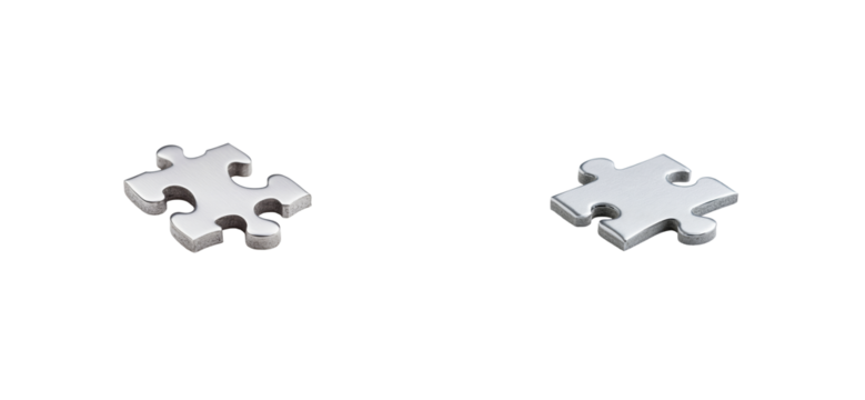 Shiny metal jigsaw pieces on black background, studio shot, cut out transparent