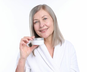 Smiling woman with jar of collagen cream on white background