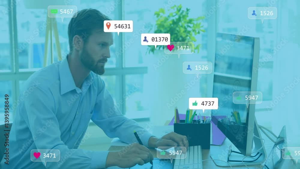 Poster working at desk, man receiving social media notifications overlaying computer screen