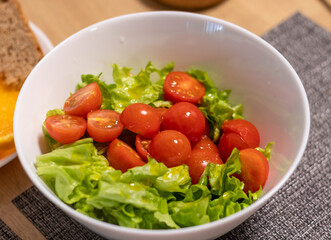 Bawl with cherry tomatoes and lettuce leaves, Food