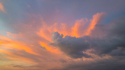 Aerial view amazing colorful pink sky in twilight above the ocean..romantic colorful sunrise scene with a bright colorful sky gradually turning into a dark night. .Sky texture background..