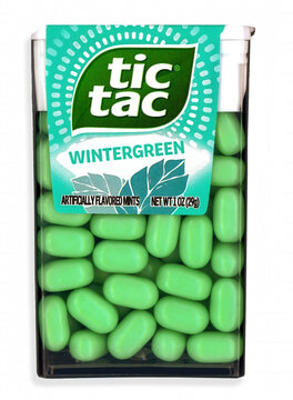 April 9, 2025. Tic Tac is a brand of small, oblong mints manufactured by the Italian company Ferrero. Sold in small, pocket-sized transparent boxes with a flip-top hinge. Wintergreen flavor shown.