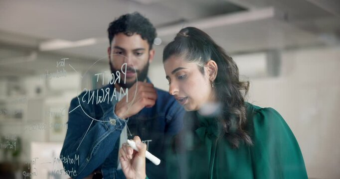 Business people, writing and mindmap with glass board for planning, brainstorming or profit margins. Businessman, woman or team taking notes with graph, chart or schedule for project ideas or layout