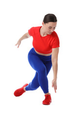 Woman in sportswear exercising on white background