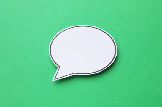 Blank speech bubble on green background. Space for text