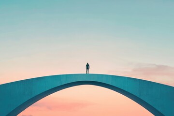 A lone figure stands on a teal arched bridge against a pastel sunset sky, contemplating the future.